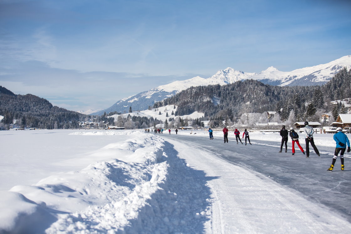 Ice skating at Lake Weissensee in Carinthia
